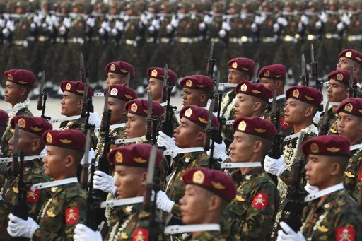 Military officers march during a parade to commemorate Myanmar's 78th Armed Forces Day in Naypyitaw, Myanmar, on March 27, 2023. Myanmar’s military government on Wednesday Feb. 14, 2024 revealed how it will implement its newly activated conscription law, saying it will draft 60,000 young men and women yearly for military service, and that call-ups will begin after the April festival marking the country’s traditional New Year. (AP Photo/Aung Shine Oo, File)