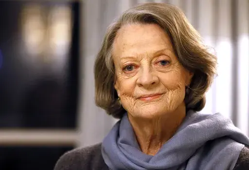British actress Dame Maggie Smith poses in London on Dec. 16, 2015. Smith, who won an Oscar for “The Prime of Miss Jean Brodie” in 1969 and won new fans in the 21st century as the dowager Countess of Grantham in “Downton Abbey,” has died at 89. (AP Photo/Kirsty Wigglesworth, File)