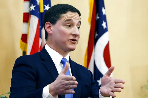 Josh Mandel, a Republican former Ohio treasurer running for an open U.S. Senate seat in Ohio, speaks during a debate against Morgan Harper, a progressive Democrat, Jan. 27, 2022, in Columbus, Ohio. As early primary voting began in the Midwestern battleground state of Ohio on Tuesday, April 5, 2022, social media users questioned the authenticity of a photo used in a campaign ad run by Mandel. (AP Photo/Jay LaPrete, File)