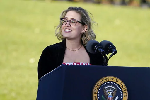 Sen. Kyrsten Sinema, D-Ariz., speaks before President Joe Biden signs the $1.2 trillion bipartisan infrastructure bill into law during a ceremony on the South Lawn of the White House in Washington, Nov. 15, 2021. Sinema received a $1 million surge of campaign cash over the past year from private equity professionals, hedge funds and venture capitalists whose interests she has staunchly defended in Congress. That's according to an Associated Press review of campaign finance disclosures.(AP Photo/