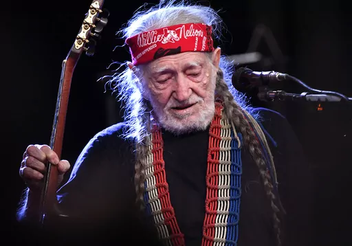 Country music legend Willie Nelson finishes his set at the Outlaws & Legends Music Fest in Abilene, Texas, on Saturday, April 1, 2023. Nelson, who will turn 90 this month, was the headlining act for the two-day festival, fulfilling a promise to come after having to forego an appearance at the 2020 festival due to the pandemic. (Ronald W. Erdrich/The Abilene Reporter-News via AP)
