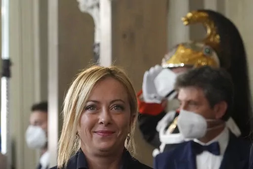 Brothers of Italy's leader Giorgia Meloni arrives at the Quirinale Presidential Palace after a meeting with Italian President Sergio Mattarella as part of a round of consultations with party leaders to try and form a new government, in Rome, on Oct. 21, 2022. As she becomes Italy's first female premier, with the world is watching closely to see if she will emerge as a firebrand leader of a far-right party with neo-fascist roots or the more moderate right-wing politician who captured 26% of the v