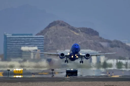 A jet takes flight as heat ripples radiate from the runway, Tuesday, July 25, 2023 at Sky Harbor International Airport, in Phoenix. The city so far this year has seen 52 days of highs at 110 degrees or over and is expected to hit that mark again on both Saturday, Sept. 9, and Sunday. (AP Photo/Matt York)