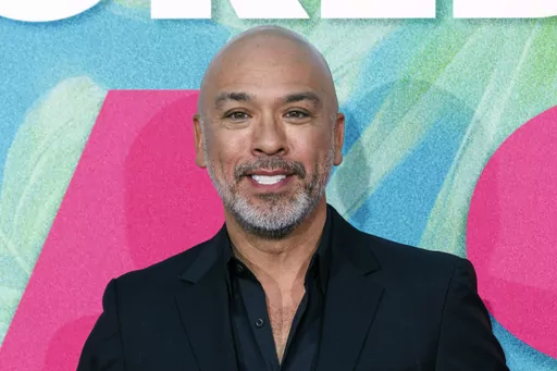 Jo Koy arrives at the World Premiere of "Easter Sunday" on Tuesday, Aug. 2, 2022, at the TCL Chinese Theatre in Los Angeles. Koy has been tapped to be the host for the Golden Globes, picked by producers for his “infectious energy and relatable humor.” (Photo by Willy Sanjuan/Invision/AP, File)