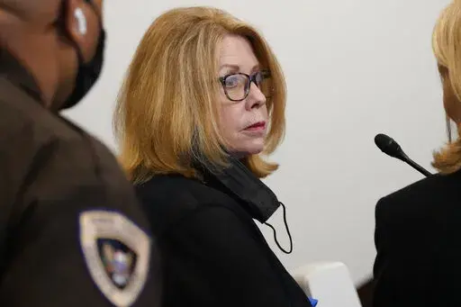 Nancy New, who with her son, Zachary, ran a private education company in Mississippi, pleads guilty to state charges of misusing public money that was intended to help some of the poorest people in the nation, at Hinds County Circuit Court, Tuesday, April 26, 2022, in Jackson, Miss. New said in a court document she directed $1.1 million in welfare money to former NFL star Brett Favre at the direction of former Gov. Phil Bryant. Bryant has denied the accusation.  (AP Photo/Rogelio V. Solis, File)