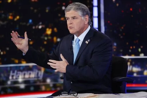 In this Aug. 7, 2019, photo, Fox News host Sean Hannity speaks during a taping of his show, "Hannity," in New York. The House committee investigating the Jan. 6 U.S. Capitol insurrection has requested an interview and information from Hannity.(AP Photo/Frank Franklin II, File)