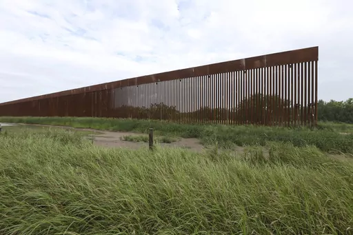 A border wall section stands on July 14, 2021, near La Grulla, Texas, in Starr County. On Wednesday, Oct. 4, 2023, the Biden administration announced that they waived 26 federal laws in South Texas to allow border wall construction, marking the administration’s first use of a sweeping executive power employed often during the Trump presidency. The Department of Homeland Security posted the announcement with few details outlining the construction in Starr County, Texas. (Delcia Lopez/The Monito