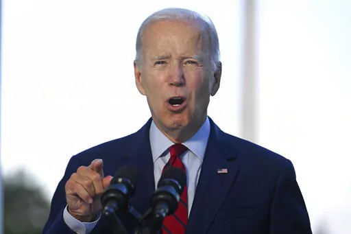 President Joe Biden speaks from the Blue Room Balcony of the White House Monday, Aug. 1, 2022, in Washington, as he announces that a U.S. airstrike killed al-Qaida leader Ayman al-Zawahri in Afghanistan. One year after ending the war in Afghanistan, Biden and top national security officials speak less about counterterrorism and more about the political, economic, and military threats posed by China as well as Russia. (Jim Watson/Pool via AP, File)