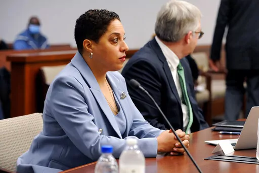 St. Louis Circuit Attorney Kim Gardner appears at her disciplinary hearing Monday, April 11, 2022, in St. Louis. Gardner has reached an agreement with the Missouri Office of Disciplinary Counsel in which she acknowledges mistakes in her handling of the prosecution of former Missouri Gov. Eric Greitens but won't face any severe penalties for those mistakes. (AP Photo/T.L. Witt, Pool via Missouri Lawyers Media)
