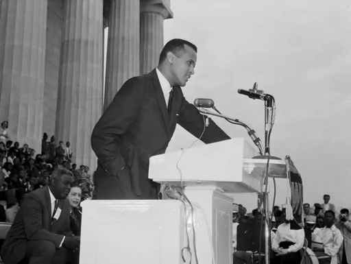 Entertainer and activist Harry Belafonte speaks to a crowd at the Lincoln Memorial in Washington during a youth march for integration, Oct. 25, 1958. Belafonte died Tuesday of congestive heart failure at his New York home. He was 96. (AP Photo/Charles Gorry, File)