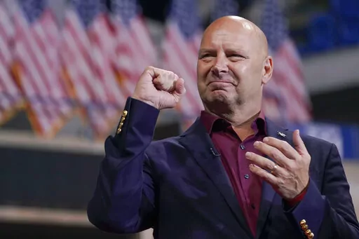 Pennsylvania Republican gubernatorial candidate Doug Mastriano speaks ahead of former President Donald Trump at a rally in Wilkes-Barre, Pa., Sept. 3, 2022. An Associated Press review has found that more than a quarter of Republican candidates for statewide office that play some role in overseeing, certifying or defending elections across 38 states supported overturning the 2020 presidential election (AP Photo/Mary Altaffer, File)
