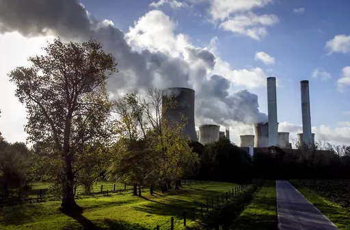 Steam rises from the coal-fired power plant Niederaussem, Germany, on Nov. 2, 2022. The cause of global warming is showing no signs of slowing as heat-trapping carbon dioxide in Earth’s atmosphere increased to record highs in its annual Spring peak, jumping at one of the fastest rates on record, officials announced Monday, June 5, 2023. (AP Photo/Michael Probst, File)