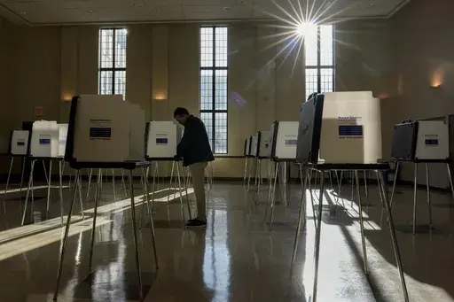 A voter fills out their Ohio primary election ballot at a polling location in Knox Presbyterian Church in Cincinnati, Ohio, on Tuesday, March 19, 2024. (AP Photo/Carolyn Kaster, File)
