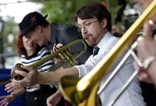 Bamm Gibson and the New Orleans Hot Jazz perform on the first day of the annual French Quarter Festival in New Orleans, April 11, 2013. Officials on Tuesday, Jan. 13, 2023, announced a lineup of more than 270 acts for New Orleans' 40th annual French Quarter Festival, billed as Louisiana's largest free showcase of music, food and culture. (AP Photo/Gerald Herbert, File)