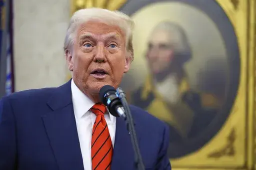 President Donald Trump speaks before Pam Bondi is sworn in as Attorney General by Supreme Court Associate Justice Clarence Thomas, in the Oval Office of the White House, Wednesday, Feb. 5, 2025, in Washington. (AP Photo/Evan Vucci)