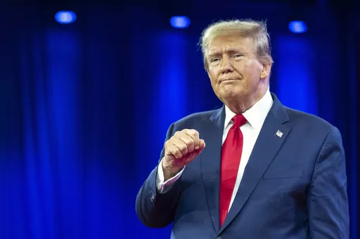 Republican presidential candidate former President Donald Trump pumps his fist as he departs after speaking during the Conservative Political Action Conference, CPAC 2024, in Oxon Hill, Md., Feb. 24, 2024. A Cook County judge ordered the Illinois State Board of Elections to take former President Donald Trump's name off of the state's March 19 primary ballot Wednesday, Feb. 28, 2024, but placed her order on hold until Friday to allow an appeal. (AP Photo/Alex Brandon, File)