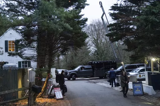 The access road to President Joe Biden's home in Wilmington, Del., is seen from the media van on Jan. 13, 2023. The Justice Department special counsel investigating President Joe Biden's handling of classified documents has completed his inquiry and a report is expected to be made public soon, Attorney General Merrick Garland told lawmakers in a letter Wednesday. (AP Photo/Carolyn Kaster, File)