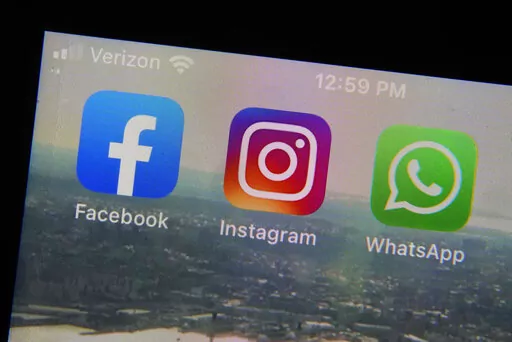 Mobile phone app logos for, from left, Facebook, Instagram and WhatsApp in are photographed in New York on Oct. 5, 2021. The seeds of misinformation about next week's midterm elections were planted in 2020. And despite efforts by tech companies to slow their spread, misleading claims about mail ballots, vote tallying and certification never went away. (AP Photo/Richard Drew, File)
