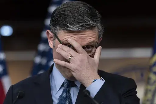 FILE—Speaker of the House Mike Johnson, R-La., takes questions from reporters after presenting his final version of an interim pending bill to his caucus, at the Capitol in Washington, Tuesday, Dec. 17, 2024. President-elect Donald Trump has now abruptly rejected the bipartisan plan to prevent a Christmastime government shutdown. Instead, he's telling House Speaker Mike Johnson and Republicans to essentially renegotiate — days before a deadline when federal funding runs out. (AP Photo/J. Sco