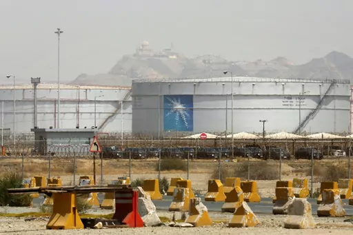 Storage tanks are seen at the North Jiddah bulk plant, an Aramco oil facility, in Jiddah, Saudi Arabia, on March 21, 2021. Saudi Arabia said Thursday, Aug. 3, 2023, it will extend its unilateral production cut of 1 million barrels of oil a day through the end of September in its effort to boost flagging energy prices. (AP Photo/Amr Nabil, File)