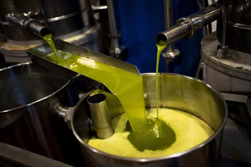 A tank is filled with olive oil at the "La Betica Aceitera" oil mill in the southern town of Quesada, a rural community in the heartland of Spain's olive country, Thursday, Oct. 27, 2022. Olive oil has increased by some 75 % since January 2021, dwarfing overall annual inflation that has already been considered unusually high over the past few years and even stood at 11.5 % in October last year. (AP Photo/Bernat Armangue, File)