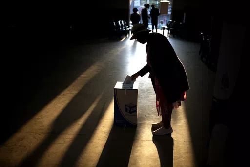 A woman casts her ballot at a polling station, during general elections in Eshowe, South Africa, Wednesday May 29, 2024. South Africans are voting in an election seen as their country's most important in 30 years, and one that could put them in unknown territory in the short history of their democracy, the three-decade dominance of the African National Congress party being the target of a new generation of discontent in a country of 62 million people — half of whom are estimated to be living i