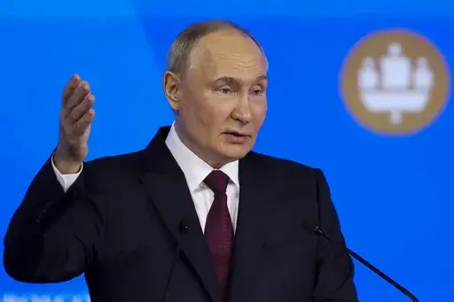 Russian President Vladimir Putin addresses a plenary session of the St. Petersburg International Economic Forum in St. Petersburg, Russia, on Friday, June 7, 2024. (Anton Vaganov/Pool Photo via AP)