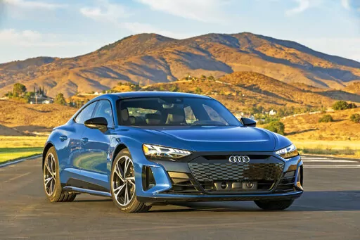 This photo provided by Audi shows the 2022 Audi, a large electric luxury sedan with an EPA-estimated range of up to 238 miles. (Courtesy of Audi AG via AP)