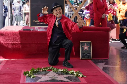 Actor James Hong poses after being honored with a star on the Hollywood Walk of Fame on May 10, 2022, in the Hollywood section of Los Angeles. has a starring role in the new “Gremlins” animated prequel, “Secrets of the Mogwai,” and pops up in “American Born Chinese” on Disney+. (AP Photo/Mark J. Terrill, File)