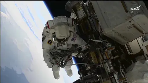 In this image, made from NASA TV, US astronaut Suni Williams works outside the International Space Station during a spacewalk, Thursday, Jan. 30, 2025. (AP Photo/NASA TV)