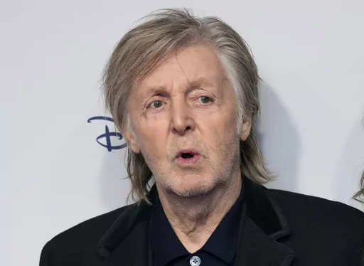 Paul McCartney and Nancy Shevell pose for photographers upon arrival for the premiere of the film 'If These Walls Could Sing' in London, Monday, Dec. 12, 2022. Artificial intelligence has been used to extract John Lennon's voice from an old demo to create “the last Beatles record,” Paul McCartney said Tuesday, June 13, 2023. McCartney, 80, told the BBC that the technology was used to separate the Beatles' voices from background sounds during the making of director Peter Jackson's 2021 docume