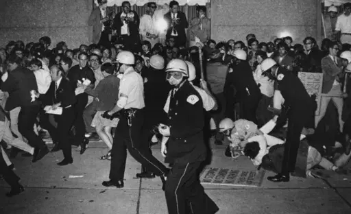 Chicago Police attempt to disperse demonstrators outside the Conrad Hilton, Democratic National Convention headquarters, Aug. 29, 1968, in Chicago. (AP Photo/Michael Boyer, File)