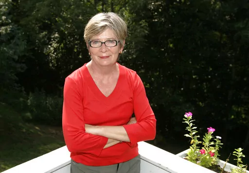 Author Barbara Ehrenreich poses at her home in Charlottesville, Va., on Aug. 25, 2005. Ehrenreich, the muckraking author, activist and journalist who in such notable works as “Nickel and Dimed” and “Bait and Switch" challenged conventional thinking about class, religion and the very idea of an American dream, died Thursday morning, Sept. 1, 2022 in Alexandria, Virginia, according to her son. She was 81. (AP Photo/Andrew Shurtleff, File)