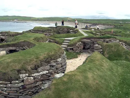 Visitors look at the 5,000 year-old remains of Skara Brae village in the Scottish Orkney Islands, July 19, 2005, which was revealed by a huge storm in 1850. Sick of being ignored by far-away politicians, officials on Scotland’s remote Orkney Islands are mulling a drastic solution. They want to rejoin Norway, the Scandinavian country that gave them away as a royal wedding dowry more than 550 years ago. Orkney Islands Council is due to debate options for “alternative models of governance” on