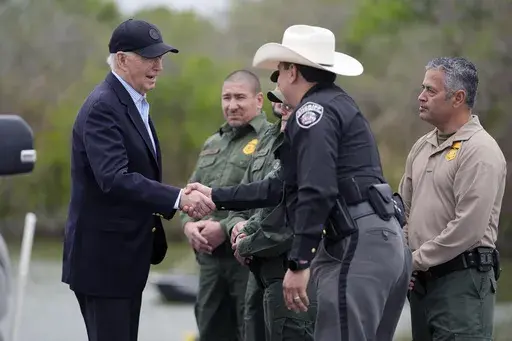 President Joe Biden talks with the U.S. Border Patrol and local officials, as he looks over the southern border, Feb. 29, 2024, in Brownsville, Texas, along the Rio Grande. (AP Photo/Evan Vucci, File)