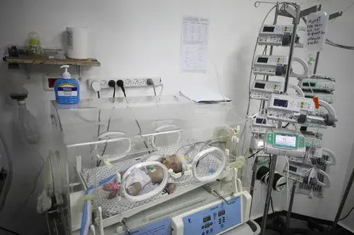 A two-month-old Palestinian baby, Eila Sarsak, receives treatment in an incubator at the Patient Friends Hospital in Gaza City, where she has been in intensive care for ten days due to the effects of the cold weather, on Tuesday, Feb. 25, 2025. (AP Photo/Jehad Alshrafi)