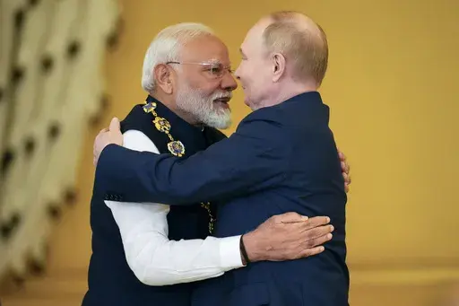 FILE- Russian President Vladimir Putin, right, awards Indian Prime Minister Narendra Modi with the Order of St. Andrew the Apostle the First-Called at the Kremlin in Moscow, Russia, July 9, 2024. (AP Photo/Alexander Zemlianichenko, File)