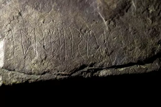 The runestone found at Tyrifjorden, Norway, is shown at the Museum of Cultural History in Oslo, Thursday, Jan. 12, 2023. Archaeologists with the Museum of Cultural History in Oslo said Tuesday, Jan. 17, 2023 that have found a runestone which they claim is the world’s oldest, saying the inscriptions are up to 2,000 years old and date back to the earliest days of the enigmatic history of runic writing. (Javad Parsa/NTB Scanpix via AP)