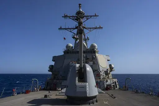 The Arleigh Burke-class guided missile destroyer USS Laboon sails in the Red Sea, June 12, 2024. (AP Photo/Bernat Armangue, File)