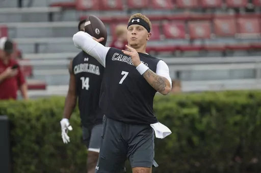 South Carolina quarterback Spencer Rattler (7) warms up before an NCAA college football game against Furman on Saturday, Sept. 9, 2023, in Columbia, S.C. (AP Photo/Artie Walker Jr.)