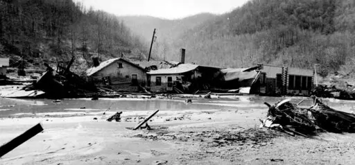 Destroyed homes and businesses are piled up against each other in the Dingess Hollow area of Lorado, W.Va., after the Buffalo Creek Dam broke on Feb. 26, 1972. (Lee Bernard/The Herald-Dispatch via AP)
