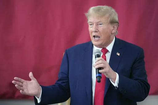 Republican presidential candidate and former President Donald Trump speaks to Texas state troopers and guardsmen at the South Texas International Airport, Nov. 19, 2023, in Edinburg, Texas. Trump's lawyers are arguing that he had a good faith basis to question the outcome of the 2020 election that he lost. A defense motion filed late Monday in federal court in Washington asserts that Trump was not obligated to accept at face value the judgments of government officials who found no widespread fra