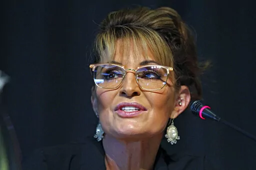 Sarah Palin, a Republican seeking the sole U.S. House seat in Alaska, speaks during a forum for candidates, Thursday, May 12, 2022, in Anchorage, Alaska. Palin and Republican Nick Begich have advanced to the August special election for the state's only U.S. House seat. (AP Photo/Mark Thiessen, File)