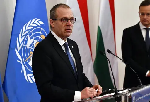 Hans Kluge, Regional Director for Europe at the World Health Organization (WHO) hold a press conference with Hungarian Minister of Foreign Affairs and Trade Peter Szijjarto, right, at the Ministry of Foreign Affairs and Trade in Budapest, April 21, 2021. The director of the World Health Organization’s Europe office said the continent is now facing a “plausible endgame” to the pandemic and that the number of coronavirus deaths is now starting to plateau. During a press briefing on Thursday,