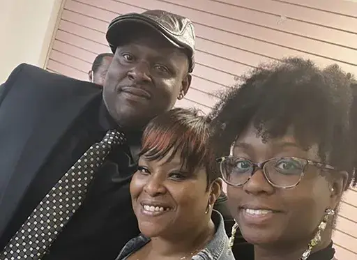 This undated photo provided by Samantha Mitchell shows D'Vontaye Mitchell, left, who died on June 30, 2024, after being pinned to the ground by hotel security guards in Milwaukee with his sister Nayish Mitchell and cousin Samantha Mitchell. (Samantha Mitchell via AP, File)