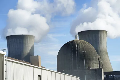 A nuclear reactor and two cooling towers are shown at Georgia Power's Plant Vogtle nuclear power plant Friday, Jan. 20, 2023, in Waynesboro, Ga. Georgia Power Co. is again delaying the projected startup for two new units at its Vogtle nuclear power plant near Augusta, saying its share of the costs will rise by a projected additional $200 million. (AP Photo/John Bazemore)