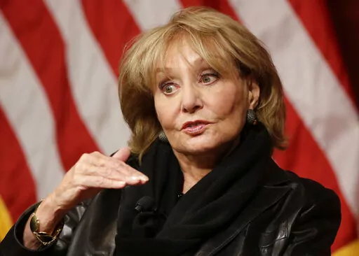 In this Oct. 7, 2014 file photo, Barbara Walters addresses an audience at the John F. Kennedy School of Government on the campus of Harvard University in Cambridge, Mass. Barbara Walters, the intrepid interviewer, anchor and program host who led the way as the first woman to become a TV news superstar during a network career remarkable for its duration and variety, has died, Friday, Dec. 30, 2022. She was 93. (AP Photo/Steven Senne, File)