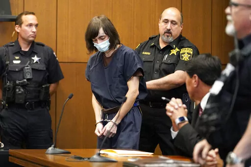 Robert E. Crimo III walks into the courtroom during a hearing in Lake County court, Aug. 3, 2022, in Waukegan, Ill. A federal warrant unsealed Thursday, March 2, 2023, says agents found bomb-making materials at the apartment of Crimo, the alleged gunman charged with fatally shooting seven people at a Fourth of July parade in suburban Chicago last year, the Chicago Tribune reported. (AP Photo/Nam Y. Huh, Pool, File)
