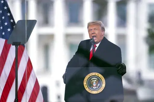 President Donald Trump speaks during a rally protesting the electoral college certification of Joe Biden as President in Washington on Jan. 6, 2021. The House panel investigating the Jan. 6 insurrection at the Capitol has identified a roughly eight-hour gap in official records of then-President Donald Trump's phone calls as the violence unfolded and his supporters stormed the building, according to a person familiar with the probe. (AP Photo/Evan Vucci, File)