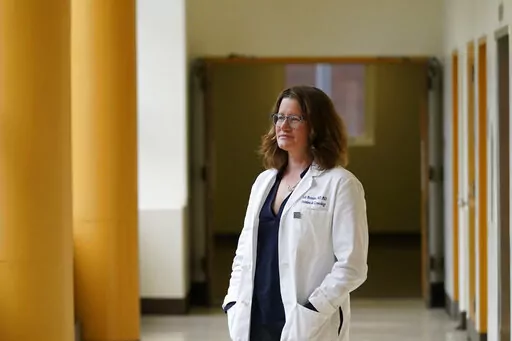 Jody Steinauer, director at the Bixby Center for Global Reproductive Health, poses for photos at Zuckerberg San Francisco General Hospital and Trauma Center in San Francisco, Thursday, March 3, 2022. As members of the U.S. Supreme Court mull whether to uphold Mississippi's 15-week abortion ban, the American College of Obstetricians and Gynecologists has filed a friend-of-the-court brief calling the ban "fundamentally at odds with the provision of safe and essential healthcare." (AP Photo/Jeff Ch